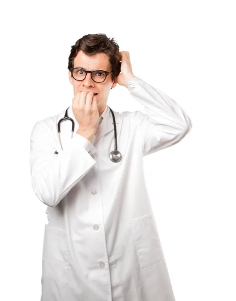 Nervous doctor against white background