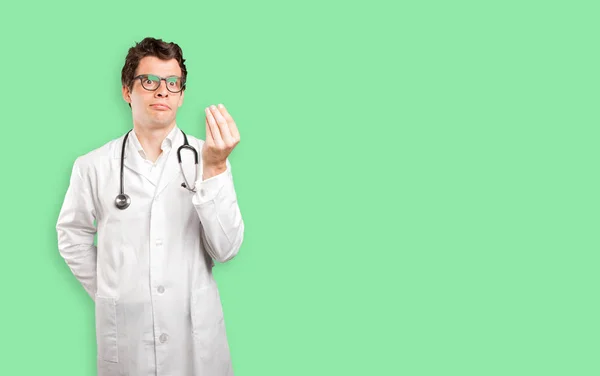 Confused doctor against white background