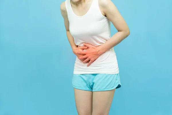 Low Body Woman Feels Abdominal Pain Wearing White Undershirt Standing — Stock Photo, Image