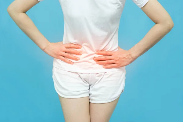 Low Body Woman Feels Abdominal Pain Wearing White Undershirt Standing — Stock Photo, Image