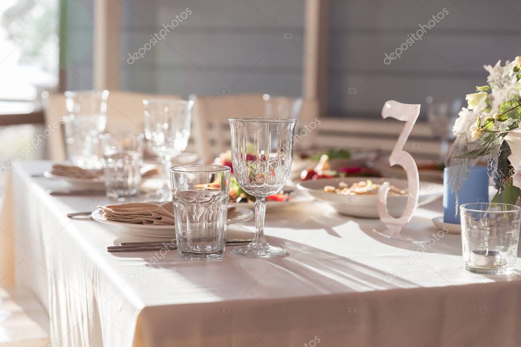 Table set for holiday, event, party or wedding reception in indoor restaurant