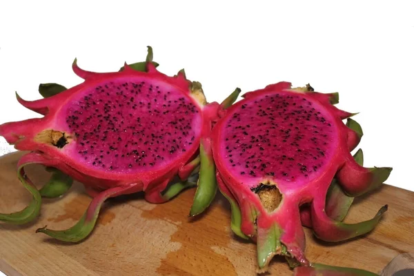 tropical fruit pink pitahaya isolated on white. closeup of dragon fruit for background