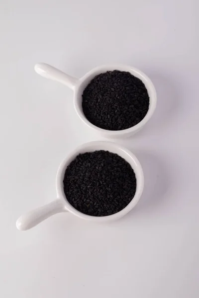 Black Sesame Seeds White Ceramic Cup White Background — Stock Photo, Image