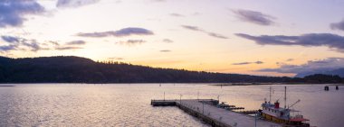 Panoramic view of Port Alberni dock at sunset, taken in Vancouver Island, BC, Canada clipart