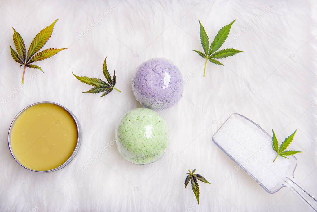 Assortment of cannabis topicals with bath bombs and marijuana sa