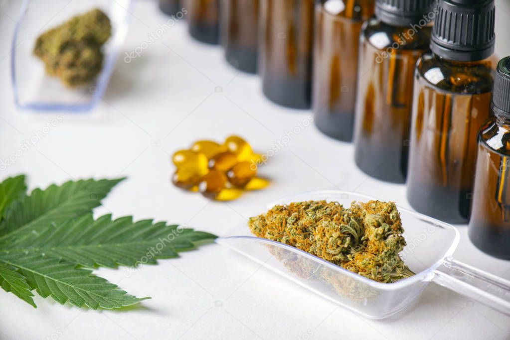 Assorted cannabis products including cannabis tincture or CBD oi