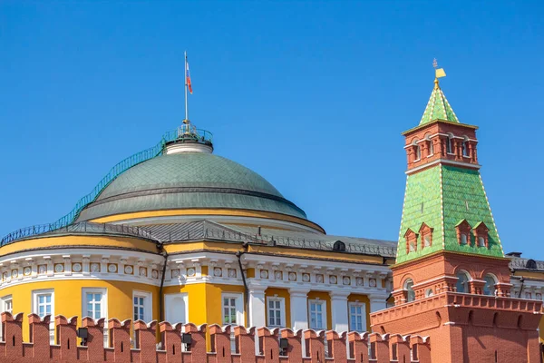 View of The Senate Tower of Moscow Kremlin and Residence of the President of Russia from Red Square in Moscow, Russia. Clear blue sky. Landmark theme.