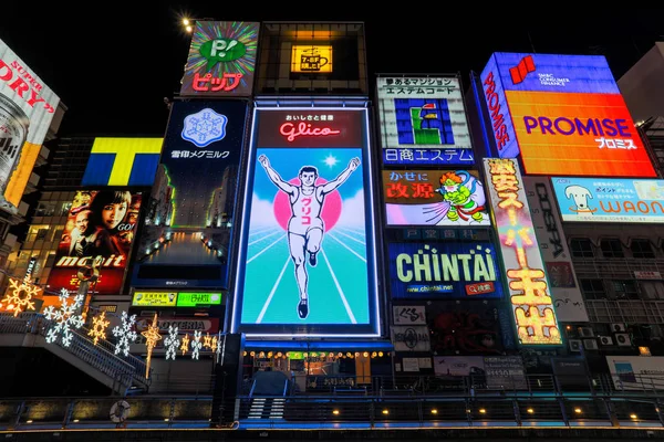 OSAKA, JAPAN - FEBUARY 08: The Glico Man light billboard and other light on Febuary 08 2015 in Dontonbori, Namba area, Osaka, Japan. Namba is now primary tourist destination.