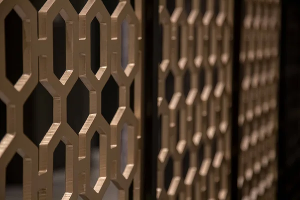 Close-up of luxury mesh gold partition indoors — Stock Photo, Image