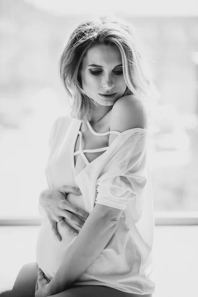 Beautiful Pregnant Woman White Transparent Sweater Background Window Backlight Hugs — Stock Photo, Image