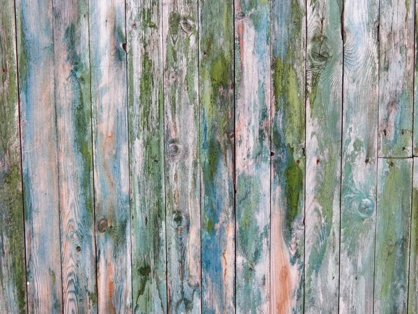 Gri-yeşil ve mavi ahşap arkaplan, ahşap bir tahtanın üst görüntüsü.