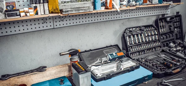 Workbench, tools kit for working on table closeup