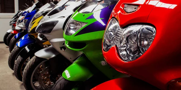 Colored sports road beautiful bikes in motor show — Stock Photo, Image