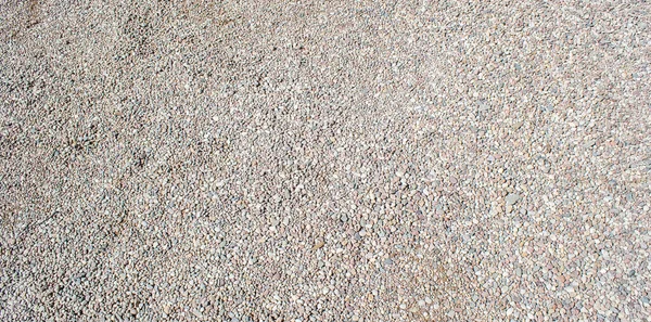 Kiesbeschaffenheit, kleine Steine, kleine Kieselsteine — Stockfoto