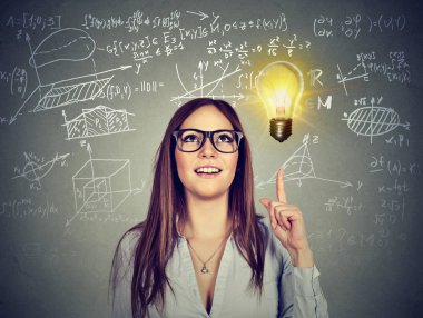 Pretty smart brunette in glasses pointing up in enlightenment of solution and creative idea clipart