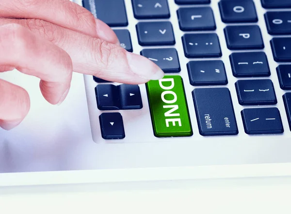 Closeup Crop Finger Pressing Green Button Word Done Laptop Keyboard — Stock Photo, Image