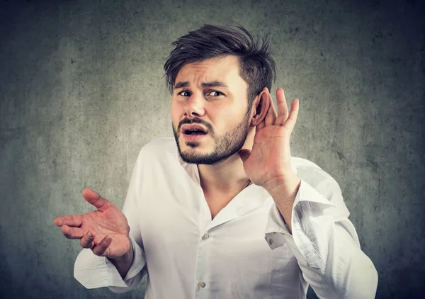 Frowning Young Man Having Problems Hearing Looking Camera Misunderstanding Gesturing — Stock Photo, Image