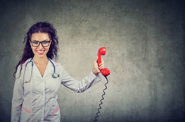 Pretty Woman White Medical Gown Holding Red Handset Supporting Help — Stock Photo, Image