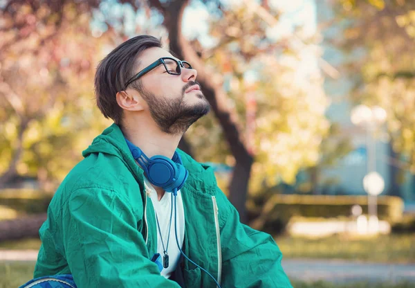 Hipster Man Headphones Glasses Keeping Eyes Closed Enjoying Fresh Air — Stock Photo, Image