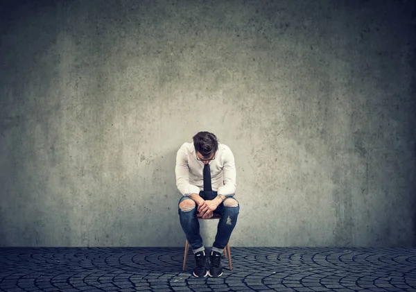 Depressed Man Upset Bad Luck Sitting Chair Alone Gray Background — Stock Photo, Image