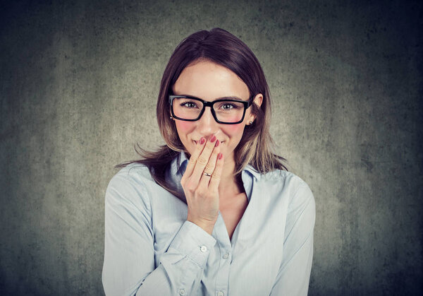 Shy young woman looking at camera 