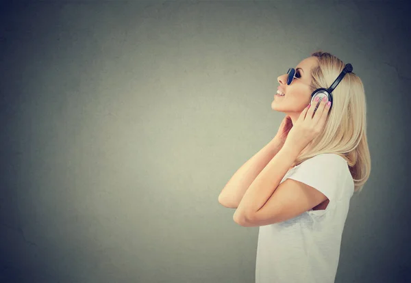 Side View Modern Woman Casual Shirt Sunglasses Listening Music Headphones — Stock Photo, Image