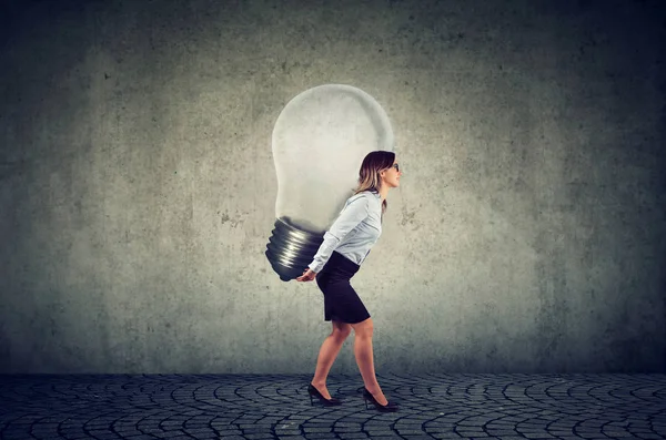 Young Businesswoman Business Idea Light Bulb Her Back — Stock Photo, Image