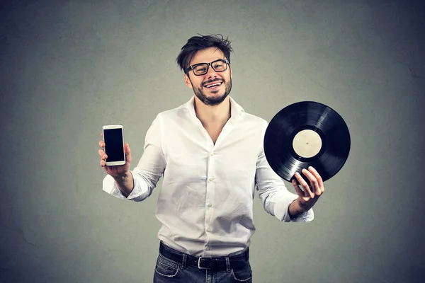 Happy Hipster Beard Man Holding Vinyl Record Disk Modern Smartphone — Stock Photo, Image