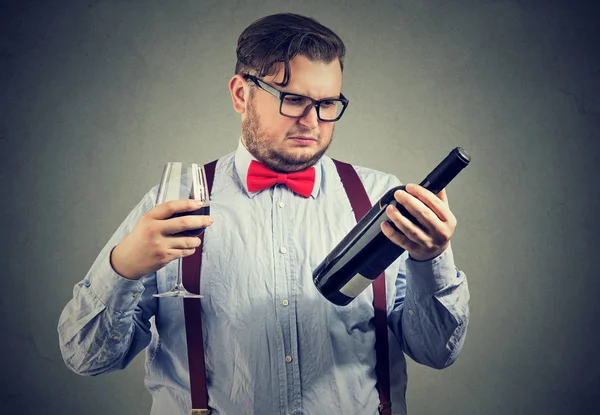 Displeased Annoyed Man Looking Bottle Red Wine — Stock Photo, Image