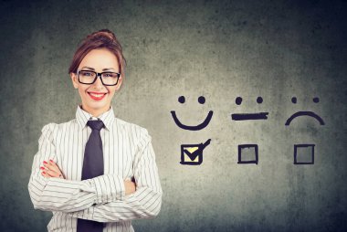 Confident happy business woman received excellent rating for a satisfaction survey clipart