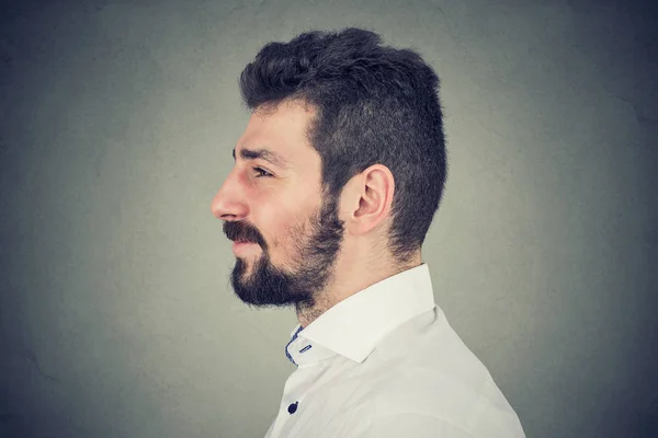 Side view portrait of a smiling bearded man — Stock Photo, Image