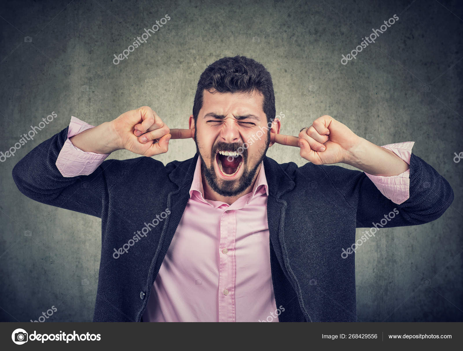 좌절한 남자가 손가락으로 귀를 막고 있습니다. — 스톡 사진 © SIphotography #268429556, image size:1600x1216