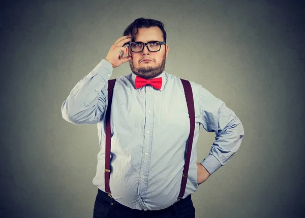Portrait of a confused thinking chubby business man — Stock Photo, Image