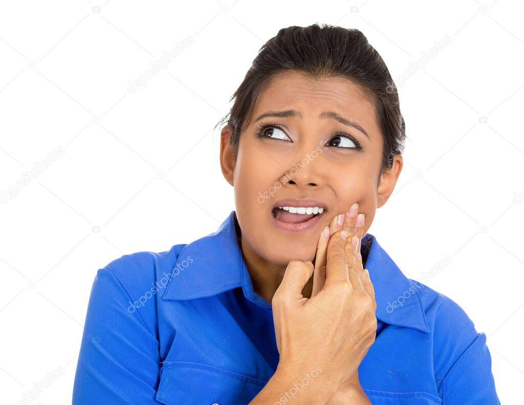 Portrait of a young woman with toothache isolated on white background 