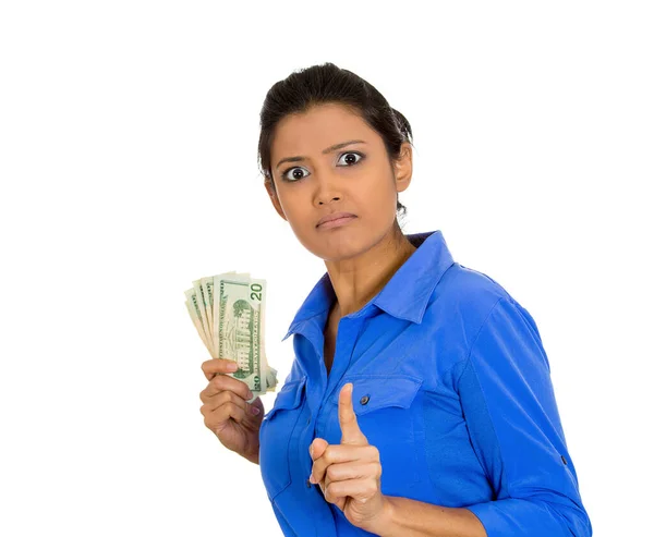 一个贪得无厌的年轻女子紧紧地拿着美元钞票 被白色背景隔开的画像 — 图库照片