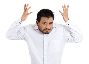 Closeup portrait of angry unhappy young man arms out asking what's the problem who cares so what, I don't know. Isolated on white background. Negative human emotion facial expression feeling clipart