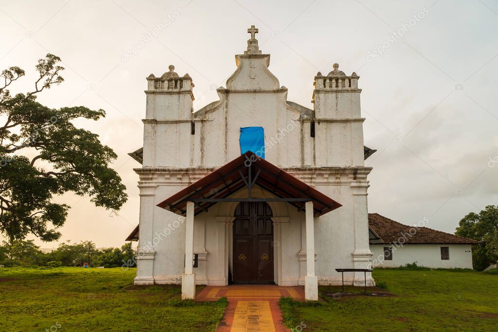 A simple entrance to the three Kings chapel with Portuguese architectural design, on a hill called Cuelim at Cansaulim in Goa, India.