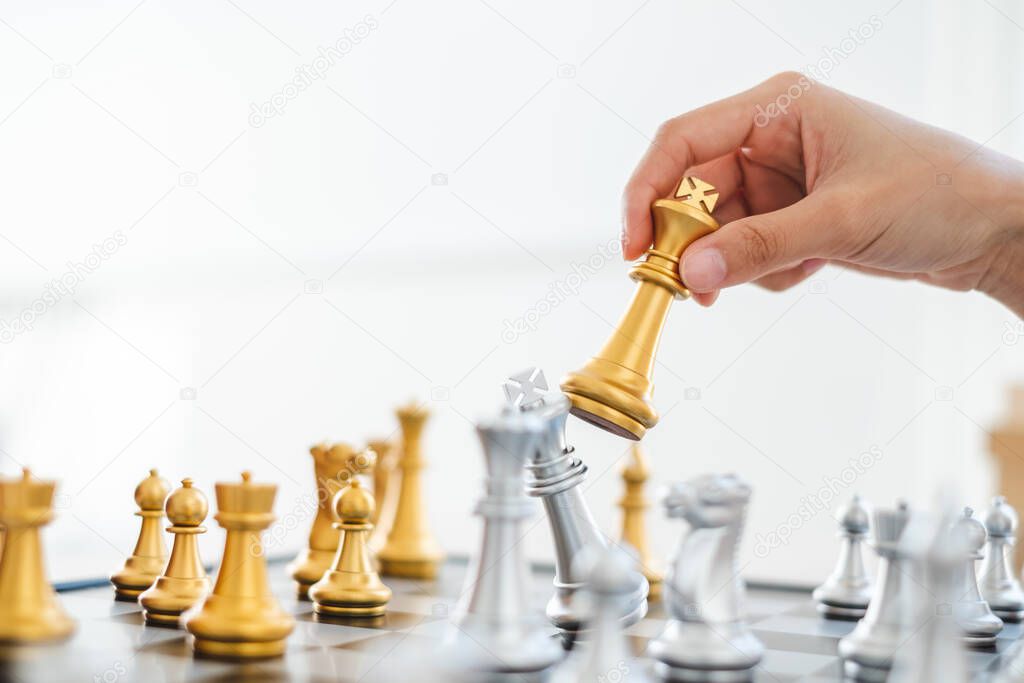 Chess game, gold and silver challenge match, planning and strategy concept