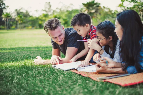 Happy Family Asian Caucasian Laying Garden Green Park Outdoor Playing — Stock Photo, Image