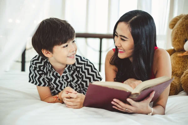 Mother Son Cute Boy Reading Book Teaching Homework Whit — Stock Photo, Image