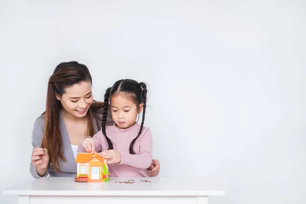 Happy Asian Family Inserting Coins Box White Background Saving Money — Stock Photo, Image