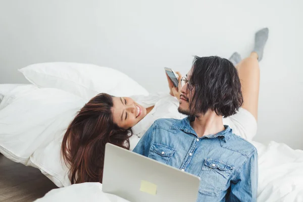 Young Asian Couple Lover Using Phone Laptop Bedroom Relax Asian — Stock Photo, Image
