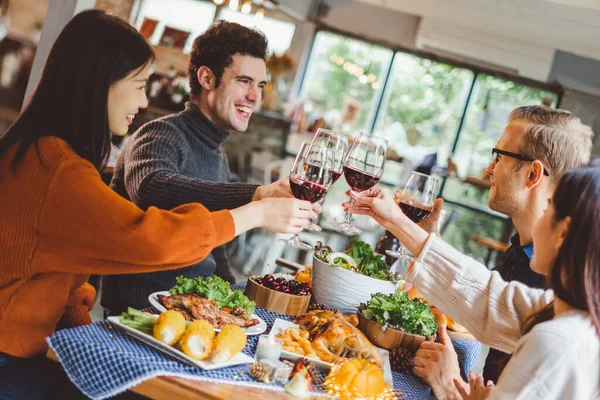 Group Young People Celebrating Christmas Party Dinner Clinking Glass Wine — Stock Photo, Image