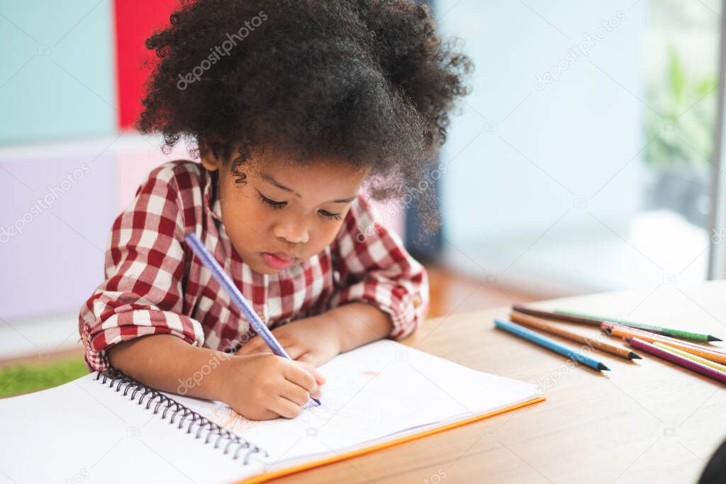 African cute kids studying  at home, kids education concept