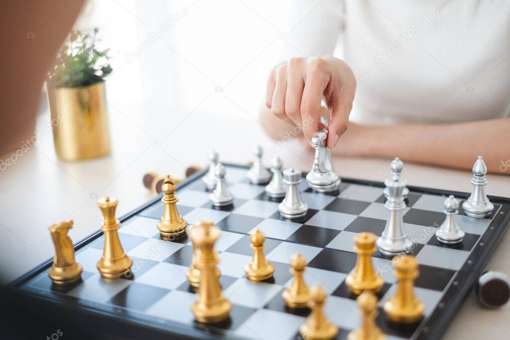 Chess game, gold and silver challenge match, planning and strategy concept