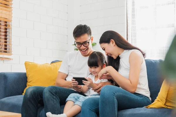 Happy Asian Family Using Tablet Laptop Phone Playing Game Watching — Stock Photo, Image