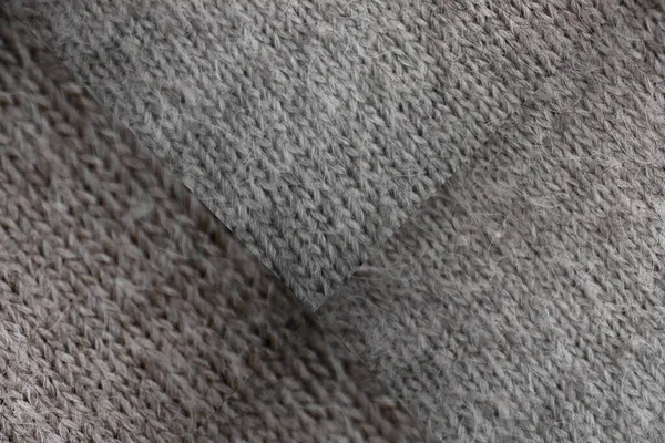 De textuur van de stof in een kleine kooi — Stockfoto