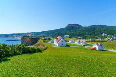 View of the Perce village, at the tip of Gaspe Peninsula, Quebec, Canada clipart