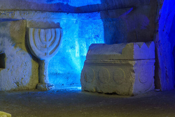 Sarcophagus and a carved Menorah, in Bet Shearim National Park