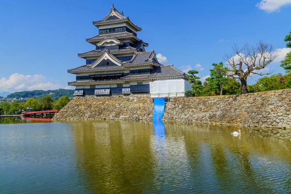 View of the Matsumoto Castle (or Crow Castle) and bridge, in Matsumoto, Japan